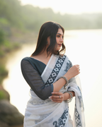 Monochrome White Elephant Motif Linen Saree